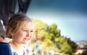 Girl looking out of train window