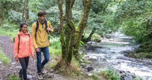 Walkers alongside East Okement River