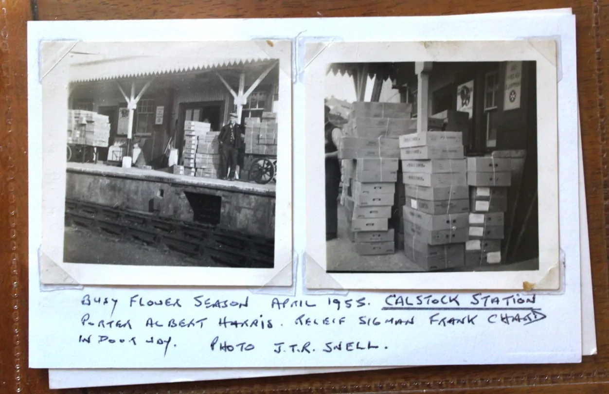 Two small black and white photos of boxes of flowers stacked up on railway station platform, with members of staff stood alongside. Caption reads: Busy flower season 1955. Calstock station. Porter Albert Harris. Relief Signalman Frank Chard in doorway. Photo J.T.R. Snell.